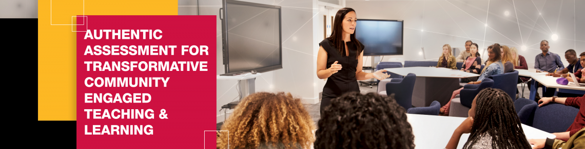 A woman with dark hair and clothing presents to a group sitting clustered around tables.