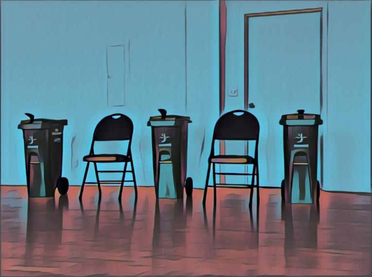 acrylic picture of chairs lined up with large garbage bins