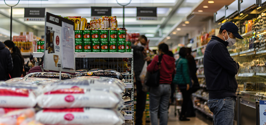 people shop in a grocery store