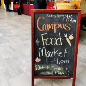 This is a picture of the campus food market sign. 